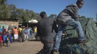 Foreign nationals pack up their shops in the small village of Primrose, near Germiston about 15kms east of Johannesburg, on 16 April 2015