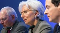 IMF Christine Lagarde holding a joint press conference with German Finance Minister Wolfgang Schauble (L) and British Chancellor of the Exchequer George Osborne (R)