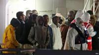 Survivors aboard Italian coastguard ship at Catania, Italy 21 April 2015