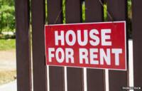 A house for rent sign