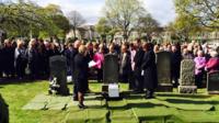 boy unidentified funeral baby minister touched leading said had service story been little