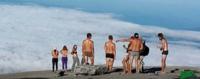 Screen grab taken from Facebook page showing tourists posing on top of Mount Kinabalu in Malaysia