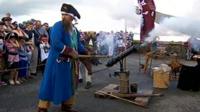 Pirate firing a canon