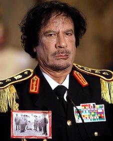 Colonel Gaddafi in military uniform, pictured at a G8 conference in 2009