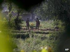 Pakistan army soldiers stand guard near the Abbottabad compound