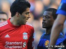 Luis Suarez and Patrice Evra