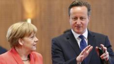 David Cameron (r) with Angela Merkel at the G7 summit