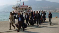 Turkish delegation of observers arrives at port of Mytilini on Greek island of Lesbos (21 March)