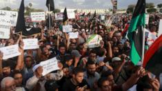 People take part in a protest against candidates for a national unity government proposed by U.N. envoy for Libya Bernardino Leon, in Benghazi, Libya October 23, 2015.