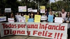 People protest against child abuse, demanding stronger penalties for violators, in downtown Asuncion Paraguay (11 May 2015)