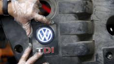 Volkswagen logo and technician