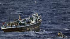 Australian sailors preparing to board dhow