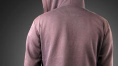 Person in hoodie photographed from behind