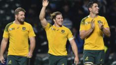 James Slipper, Michael Hooper and Rob Simmons celebrate Australia's win over Argentina