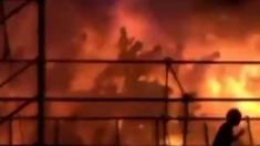 This frame grab from video footage provided by Apple Daily from reader Miss Huang shows revellers being engulfed by flames at the Formosa Fun Coast water park in Taipei on Saturday (27 June 2015)