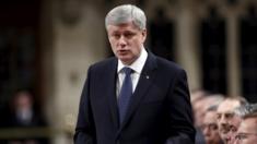 Canada"s Prime Minister Stephen Harper outlines his government"s plans to expand its military mission against Islamic State by launching air strikes against its positions in Syria as well as Iraq, in the House of Commons on Parliament Hill in Ottawa 24 March 2015
