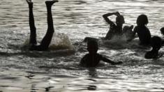 Children play in the waters of Lake Chad close to the village of Guite, Chad - Monday 30 March 2015