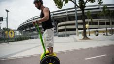 Tourists ride on a Segway in Rio de Janeiro, Brazil