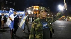 Veterans of the 1982 Falklands War marching on the eve of the 33rd anniversary of the conflict