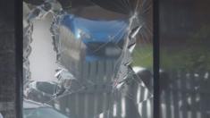 A broken window from a police raid at a house in Hallam, a suburb of Melbourne, where police made one of several arrest during terror raids in Melbourne, Australia, 18 April 2015