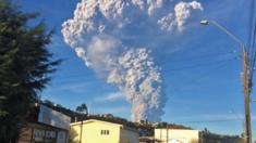 View from Puerto Varas, southern Chile, of a high column of ash and lava spewing from the Calbuco volcano, on April 22, 2015.