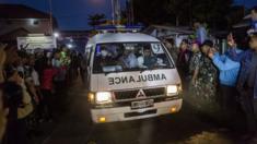 An ambulance carrying a coffin containing the body of one of the eight drug traffickers leaves Wijaya Pura port after the execution at Nusakambangan prison on April 29, 2015