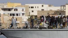 Rescued migrants arrives in the harbor of Lampedusa, Southern Italy, Saturday, May 2, 2015.