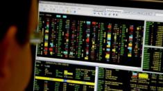 Trader looking at screen