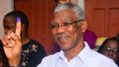 Presidential Candidate of the A Partnership for National Unity and Alliance For Change (APNU+AFC) David Granger displays his inked finger after voting at the Enterprise Primary School Georgetown Guyana, Monday, May 11, 2015
