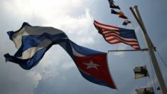 Cuban and US flags over nautical club in Havana - 15 May