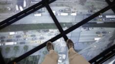 A view through the Sky Portal shows a live video view of the streets below from One World Observatory, Wednesday, May 20, 2015, in New York