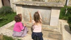 Amber Yates and Charlotte Reading at Nether Winchendon table tomb