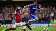 Luis Antonio Valencia of Manchester United tackles Nemanja Matic of Chelsea
