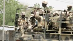 Soldiers are seen on a truck in Maiduguri in Borno State, Nigeria 14 May 2015