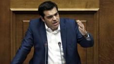 Greece's Prime Minister Alexis Tsipras gives his speech during an emergency parliament session in Athens, on Friday, 5 June 2015