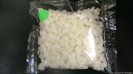 Envase con cebollas cortas