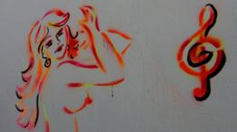 Dibujo en la pared de un bar donde trabajan venezolanas.