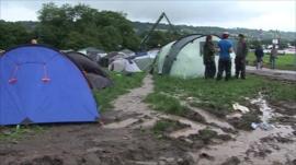 Tents in muddy field