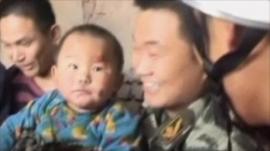 Child with rescuers
