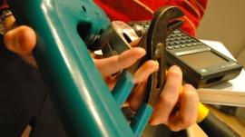 Hands holding power tools