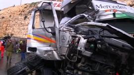 Collision between school bus and Israeli truck in West Bank.
