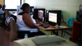 Jobseeker at a computer workstation
