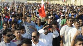Crowds in funeral procession