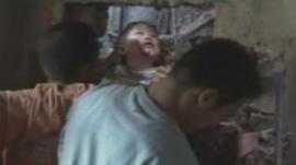 Boy trapped in wall