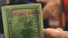 One of the specially-marked 'Secret Santa' $100 bills