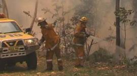 Two fire fighters tackle blaze