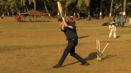 David Cameron playing cricket in India