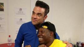 Robbie Williams and Dizze Rascal