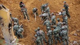 Rescuers look for landslide victims in Bijie, southwest Chinas Guizhou province