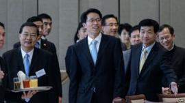 Zhang Xiaoming, head of the city's Beijing liaison office